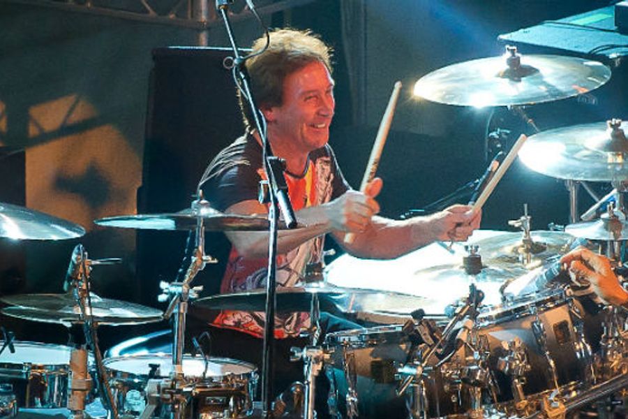 Unleash Your Inner Rock Star: With  a 1 hr drumming session with rock legend Kenney Jones